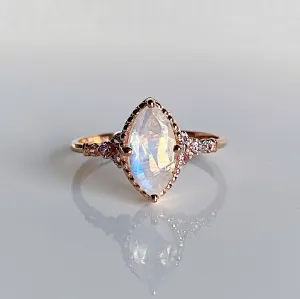 Lovestruck moonstone and tanzanite ring
