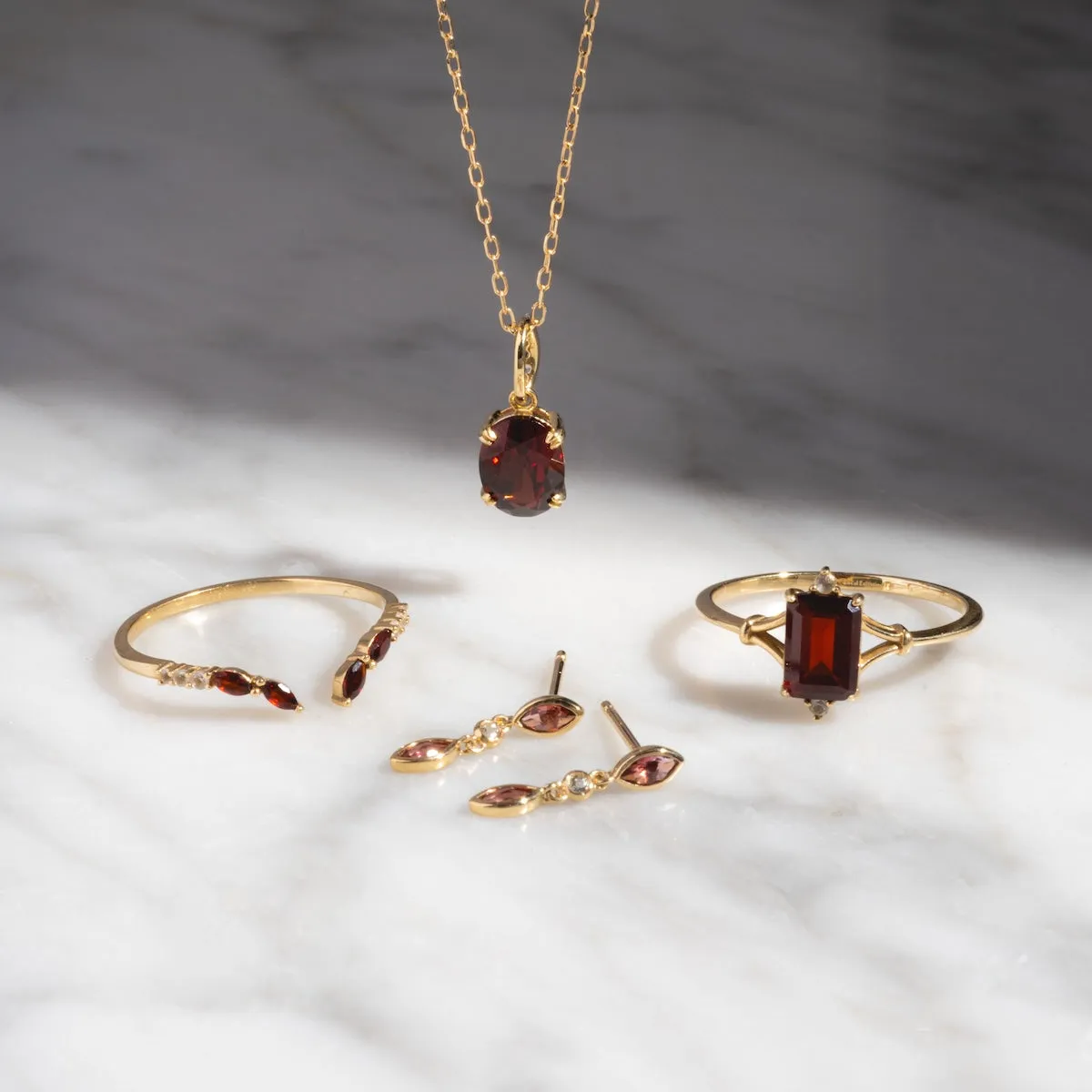 Solid Gold 2025 January Capsule Garnet Stacking Set with Free Gift